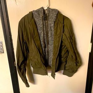 Bomber jacket with attached hoodie. Used but in good condition.